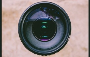 Taiwan’s largest camera lens supplier settles lawsuit with competitor